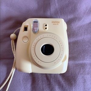 yellow polariod canera